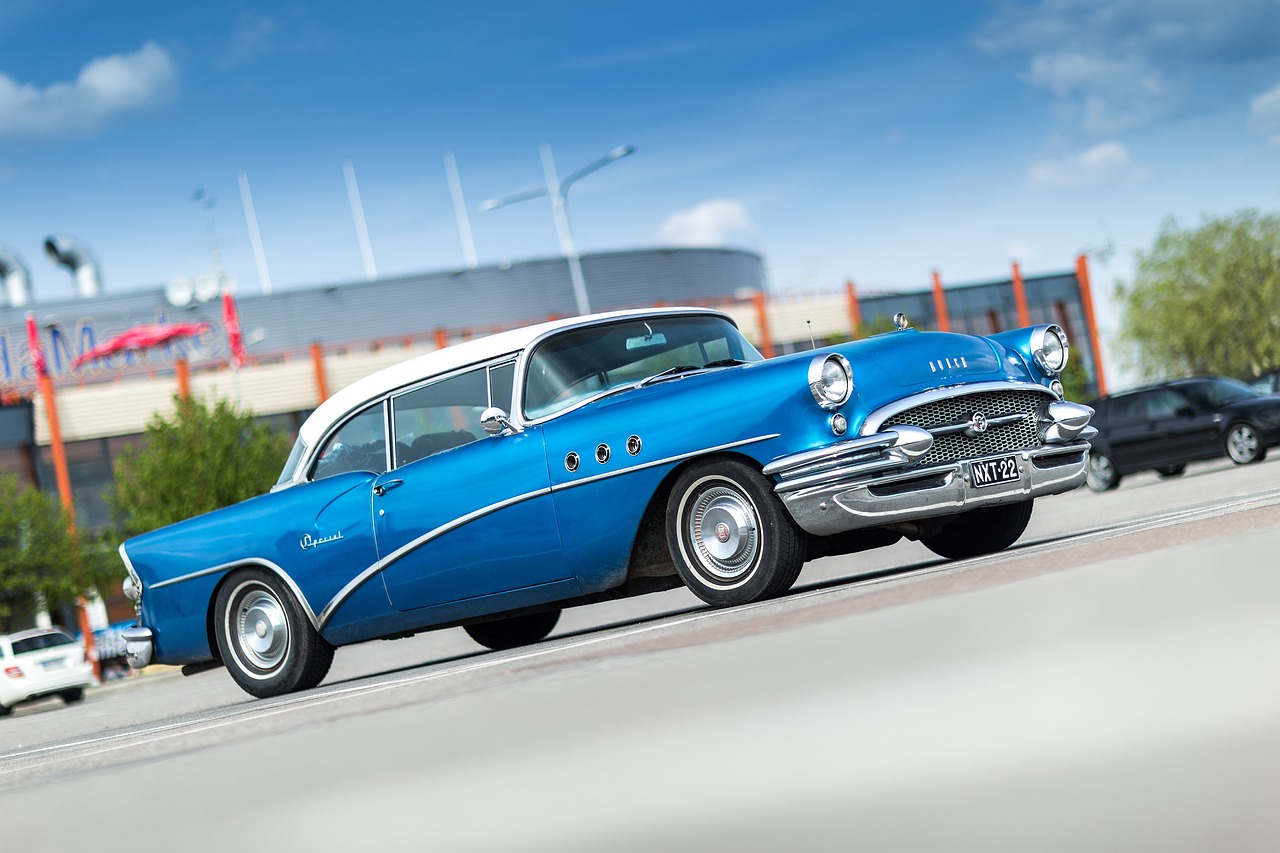 A blue classic car returned as the top result for a natural-language photo search